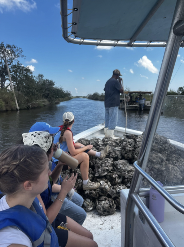 Tulane students worked with the Native American tribe at the Atakapa-Ishak Grand Bayou Indian Village to help restore the coast in the "Indian Tribes on the Bayou" course.